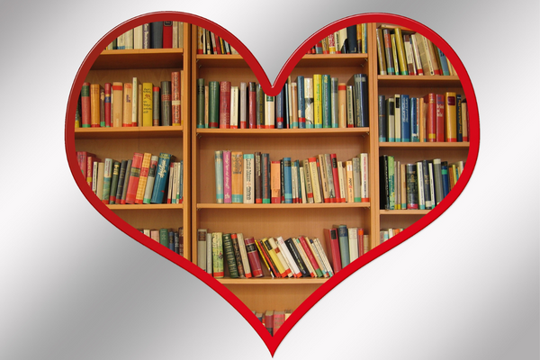 red heart outline with books on shelves inside the heart