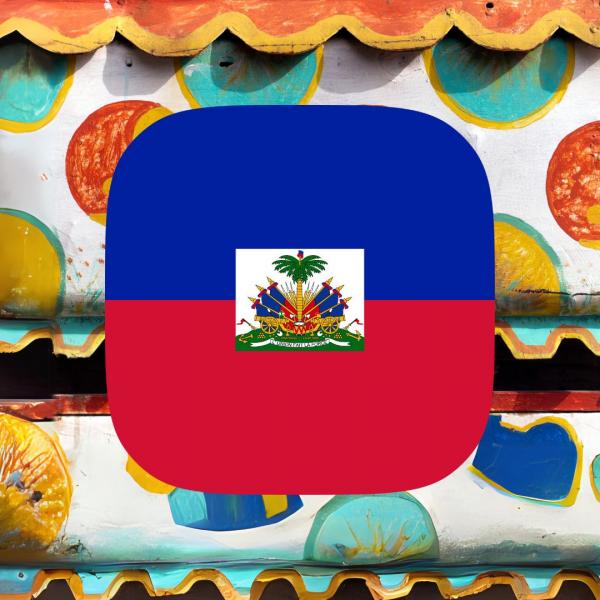 Flag of Haiti viewed in front of tap tap bus