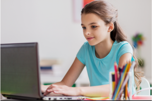 girl using laptop computer