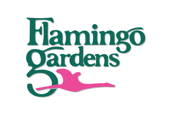 flying pink flamingo and words flamingo gardens