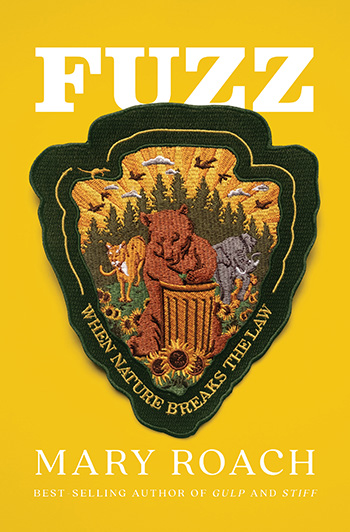 Picture of Yellow Book with Patch of cougar, elephant, and bear