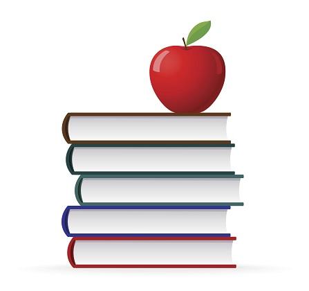 Stack of five multi-colored books with a red apple on top.